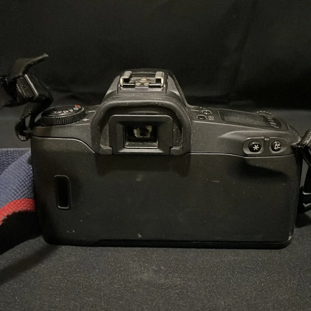 Canon EOS Revel G 35mm film camera with case.